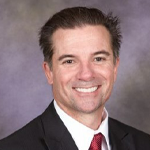 A headshot of Kimo Pickering